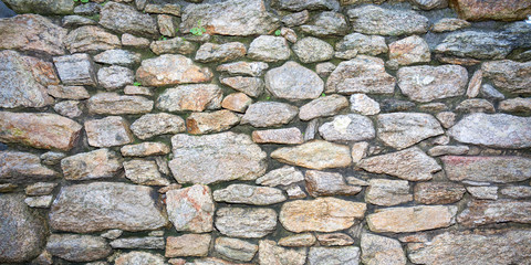 Old beautiful grey rustic background stone wall several shades of gray