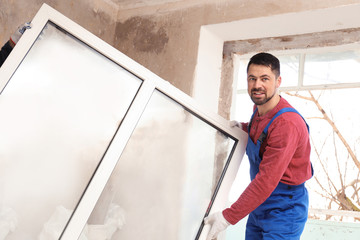 Canvas Print - Workers in uniform with plastic window indoors