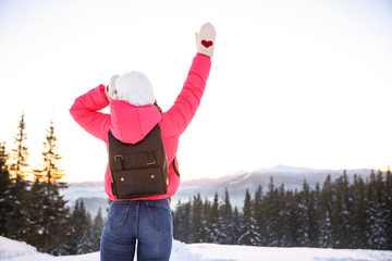 Sticker - Young woman outdoors, space for text. Winter vacation