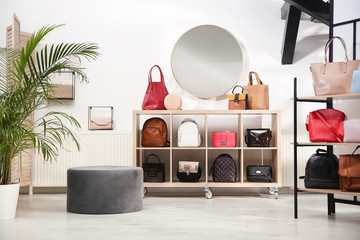 Wall Mural - Collection of stylish woman's bags in modern store