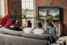 Excited Group Of People Watching American Football, Sport Match At Home. Multiethnic Group Of Emotional Friend, Fans Cheering For Favourite National Team, Drinking Beer. Concept Of Emotions, Support.