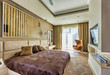 © MDBPIXS - Full length view of luxurious bedroom in new apartment
