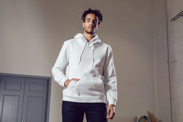 Poster - Attractive african american man in hoodie sweater. Mock-up.