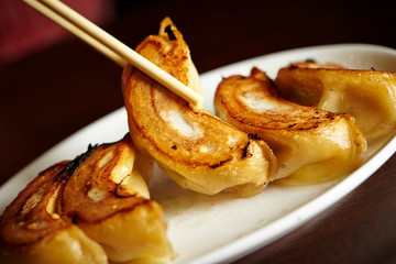 Poster - Pan fried dumpling on white plate