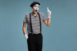 © Ljupco Smokovski - Mime gesturing with his finger getting an idea
