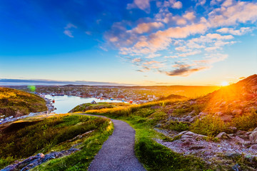 Wall Mural - View of St John city from Signal Hill at Newfoundland, Canada with sunset sky as background during summer