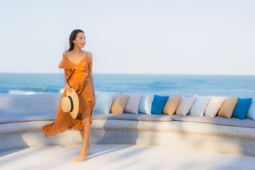 Portrait beautiful young asian woman happy smile around sea ocean beach