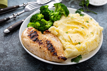 Wall Mural - Healthy and filling dinner with grilled chicken breast, mashed potatoes and broccoli