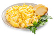 Plate with scrambled egg and bread on white background