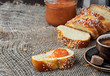 Slised sweet braided bread loaf . Challah, coffee and jam, concept holliday brackfast. Closeup, shallow depth of field
