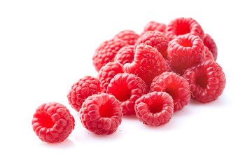 Poster - Raspberry heap in closeup on white