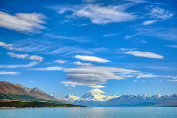 Sticker - Mount Cook on a day with beautiful clouds and blue skies is a wonderful natural view of Lake Pukaki during the summer season at Pukaki, Canterbury, New Zealand.