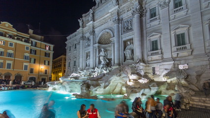 Poster - The famous Trevi Fountain at night timelapse .