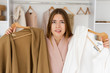 Woman having a hard time deciding what to wear