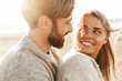 Leinwandbild Motiv Close up of a smiling beautiful young couple