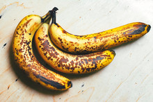 Ripe Yellow Bananas Fruits, Bunch Of Ripe Bananas With Dark Spots On A White Background With Clipping Path...
