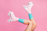 Cropped close-up profile side view of nice attractive lovely perfect feminine long legs wearing blue socks skates skating walking in air isolated over pink pastel color background