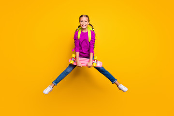 Wall Mural - Full length body size view of her she nice attractive glad cheerful cheery girl jumping carrying longboard pass exam test isolated on bright vivid shine vibrant yellow color background