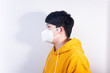 © Steve - A man wearing a N95 medical protective mask