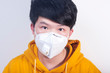 © Steve - A man wearing a N95 medical protective mask