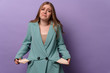 © Drobot Dean - Sad displeased woman showing empty pockets.