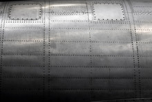 Old Gray Fuselage Of A Vintage Aircraft Background