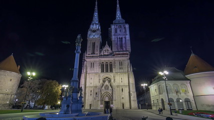 Wall Mural - Entrance to Zagreb Cathedral night timelapse  and Monument called Maria's pillar. ZAGREB, CROATIA