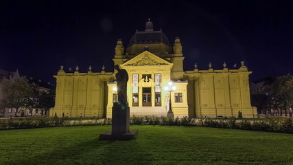 Sticker - art pavillion in Zagreb night timelapse . Croatia