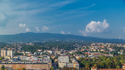 Sticker - Panorama of the city center timelapse of Zagreb, Croatia, with modern and historic buildings, mountains on background.