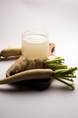 Wall Mural - Healthy Fresh daikon juice or Mooli extract drink in a glass with raw mule