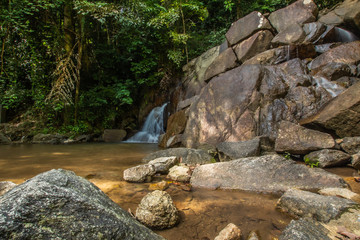 Canvas Print - Kathu Waterfall in the tropical forest area In Asia, suitable for walks, nature walks and hiking, adventure photography Of the national park Phuket Thailand,Suitable for travel and leisure.