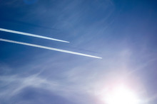 Two Planes Flying In The Sky