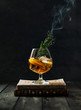 Cognac with smoking branch of lavender