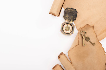 Sticker - top view of vintage compass, keys and aged parchment paper isolated on white