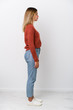 © Asier - Full body young caucasian woman gazing left, sideways pose.