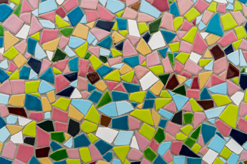 Pattern texture of colorful small mosaic tiles on the wall