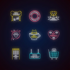 Poster - Pet friendly emblems neon light icons set. Four-legged friends allowed territories, kitty and doggy welcome public places. Signs with outer glowing effect. Vector isolated RGB color illustrations