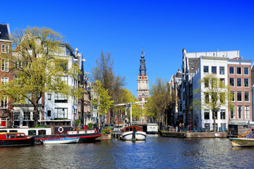 Canvas Print - Scenic architecture of Amsterdam with canal houses, lifting bridge and old clock tower, Netherlands