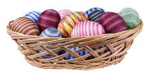 Easter Eggs Decorated By Cotton Thread In Wicker Basket Isolated On White Background. Streaked Egg Shells Wrapped By Glued Thin Colored Sewing Yarn. Ornate Decoration. Front View. Full Depth Of Field.