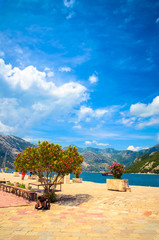 Wall Mural - Beautiful mediterranean landscape. Our Lady of the Rock Island near town Perast, Kotor bay, Montenegro.