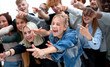 © ASDF - close up. a group of young people pointing at one point