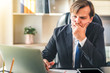 © totojang1977 - Businessman looking at laptop monitor and make serious face due to business investment revenue stock down