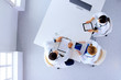 © khmelev - Group of doctors with gadgets in hospital , top view