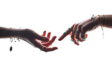 Hands Of A Witch Fortune Teller Sorcerer Wearing Silver Rings With Turquoise Stone And Bracelets On A White Background