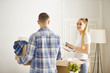 © lenetsnikolai - happy Young couple moving in new home