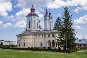 Canvas Print - Side view of church in Ciolanu Orthodox Monastery near Tisau and Magura villages in Romania