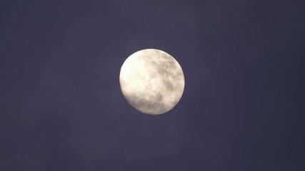 Wall Mural - Time lapse of Big full moon behind moving clouds in 4K 