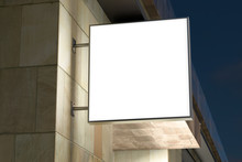 Square Singboard Or Signage On The Marble Wall With Blank White Sign Mock Up. Night Scene. Bottom View. 3d Illustration