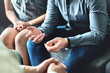 © terovesalainen - Couple counseling or therapy session. Man talking about problems in the family. Husband and wife meeting their psychiatrist. Discussion with marriage counselor, mediator or relationship psychologist.