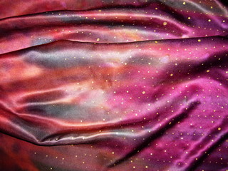 pink silk fabric with drapery. the texture of the fabric. natural silk. silk scarf, silk scarf.